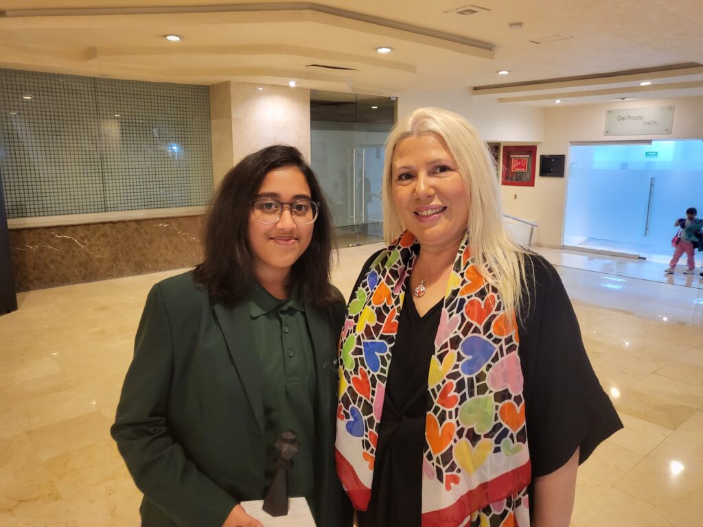 Trisha standing with Susan Polgar